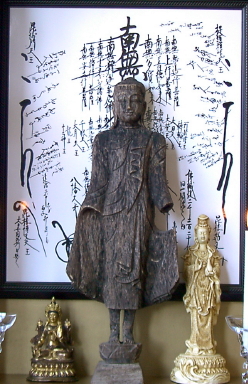 The Eternal Buddha flanked by two female manifestations of Avalokitesvara [25th chapter of the Lotus Sutra]