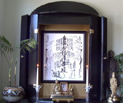 Don's altar in May 2000 embracing the pantheon of the Buddha's Teachings illumated by the Gohonzon