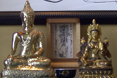 Two Buddhas guarding the Gohonzon in April 2000
